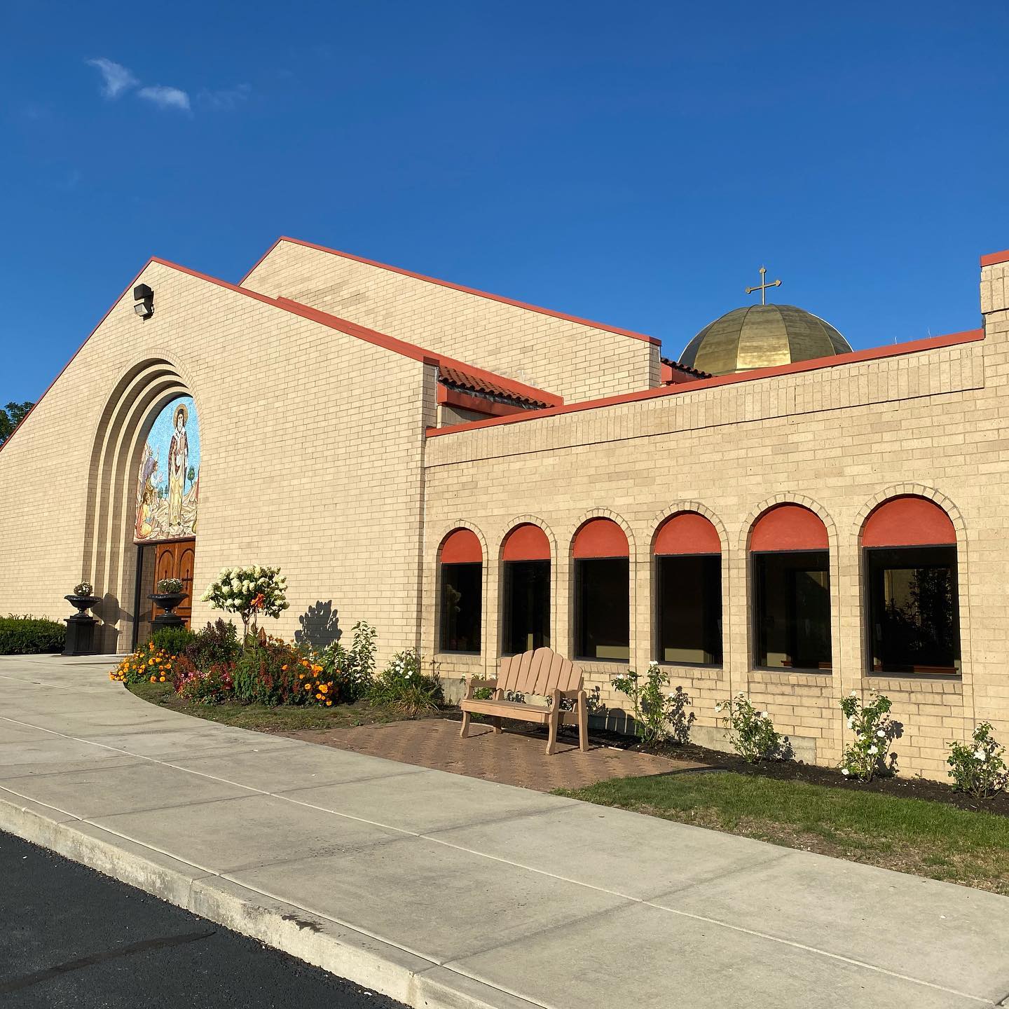 Exterior of St. Nectarios Greek Orthodox Church with its arched entrance