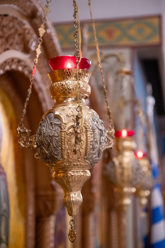 St-Nec-Web-Funeral-B Candles in the church at St. Nectarios